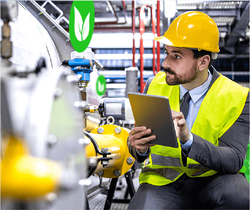 Maintenance worker in a hard hat holding a tablet